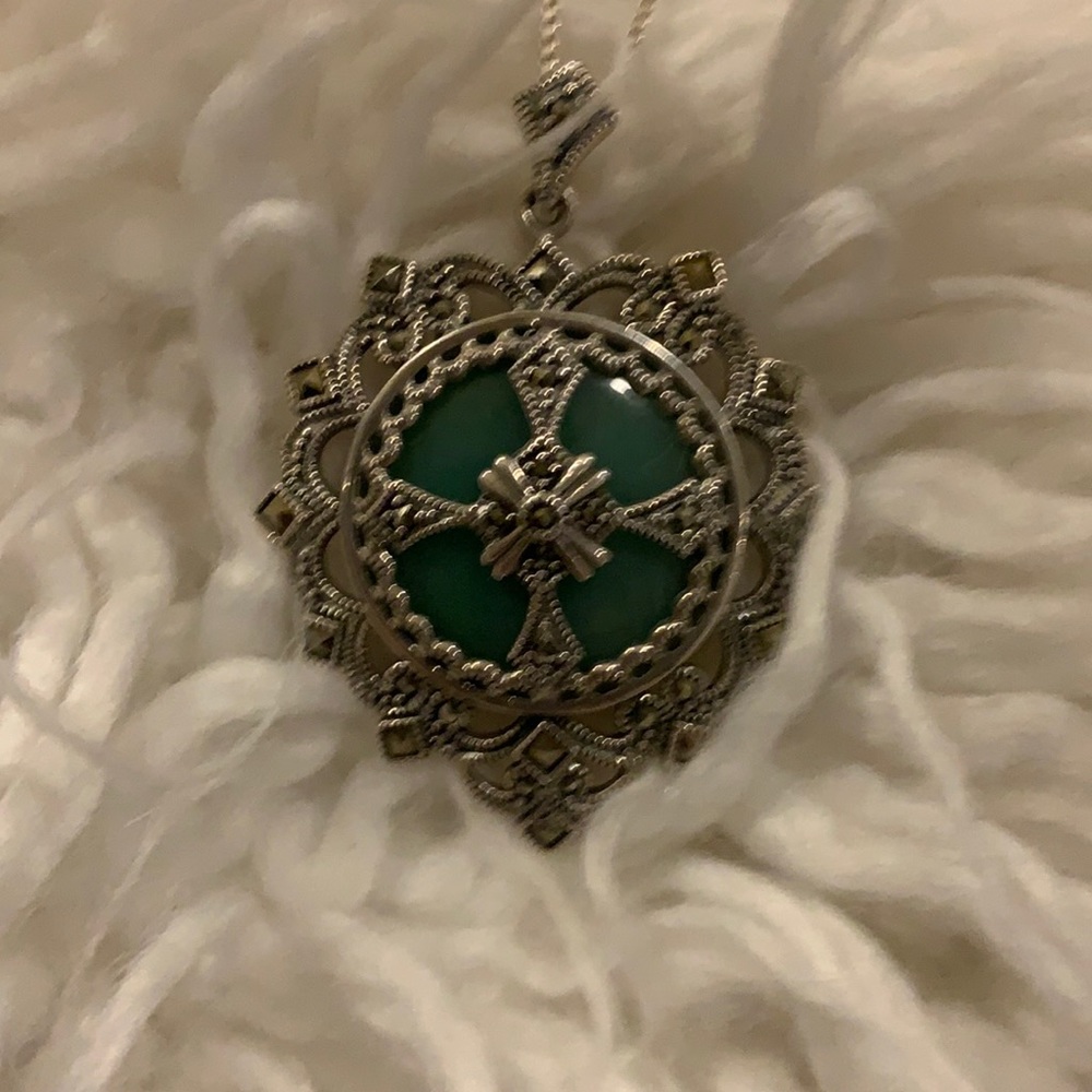 Vintage jade and marcasite SS necklace w/24” SS chain. Measures 1 3/4” x 1”